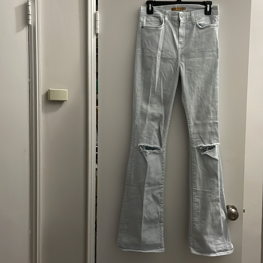 Rebecca Minkoff sunset flare midrise Jean in baby blue with distressed knee